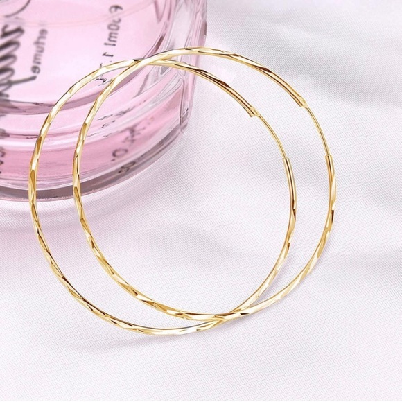 14K Yellow Gold Endless Twist Hoop Earrings, 50mm - Picture 3 of 6